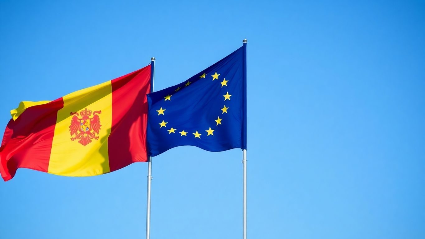 Steagurile României și UE fluturând împreună în aer liber.